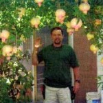 Alex Silber standing in the Papaya Tree Nursery